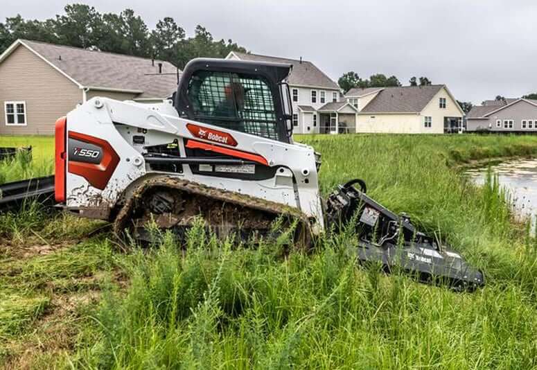 Bobcat T550 with Brushcat Rotary Cutter Attachment