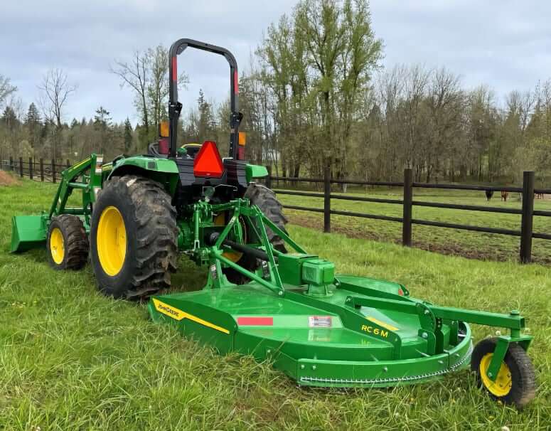 John Deere 4044M with Front Loader and Rotary Cutter Attachments