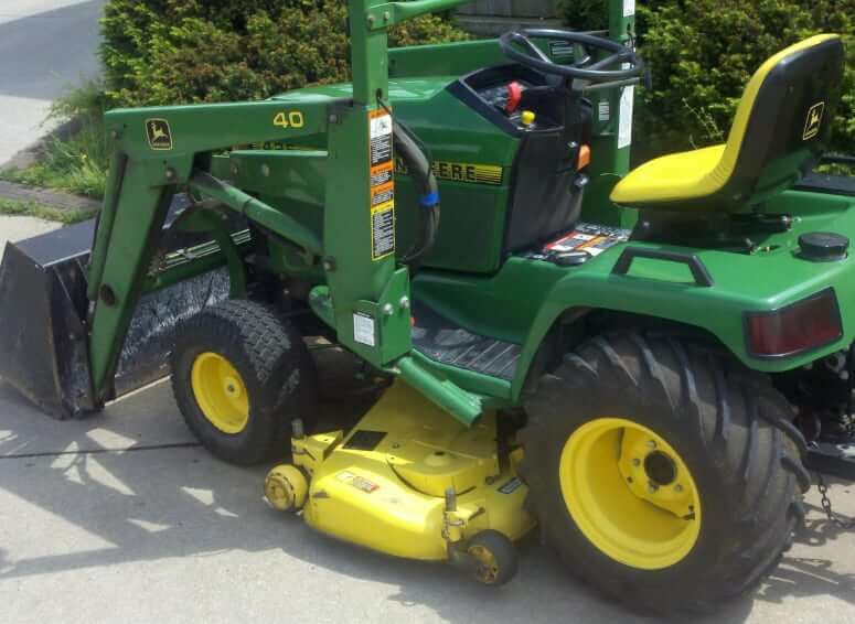 John Deere 425 with Front Loader and Mid-Mount Mower