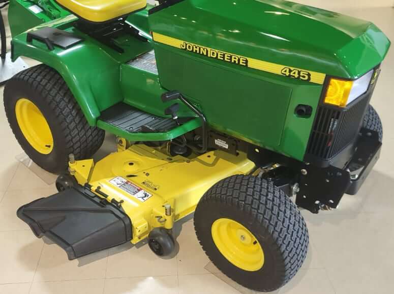 John Deere 445 with Mid-Mount Mower Deck Attachment