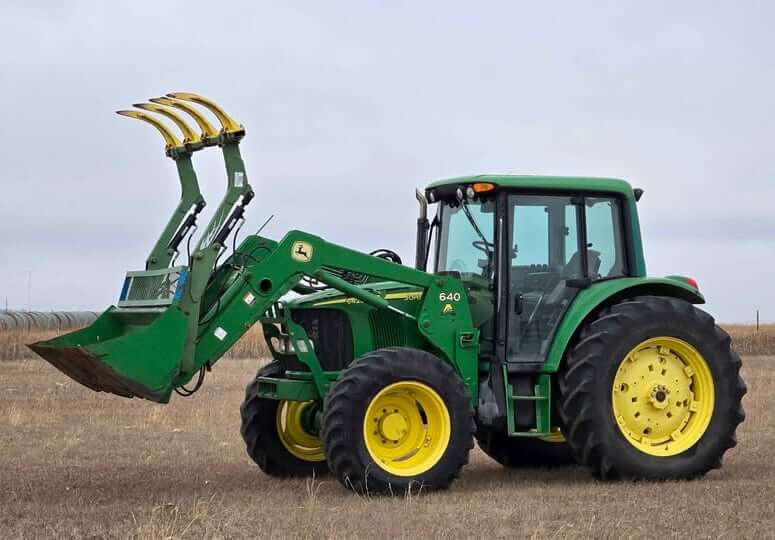John Deere 6420 Tractor with 640 Grapple Loader