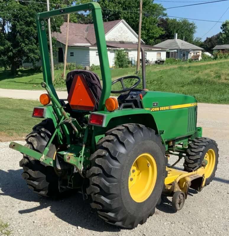 John Deere 770 Tractor with Mid-Mount Mower Deck