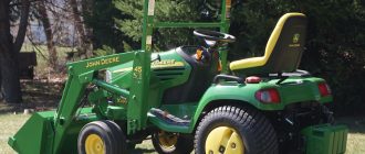 John Deere X495 Front End Loader attachment