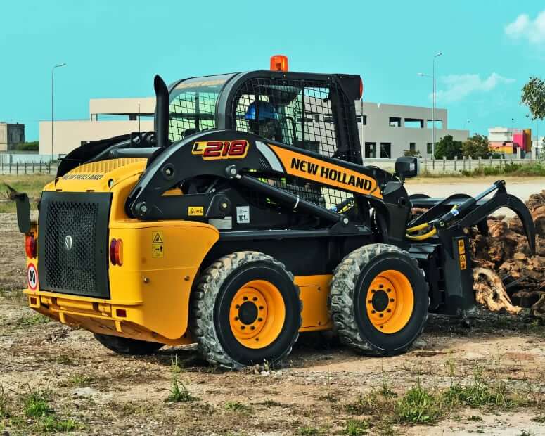 New Holland L218 with Grapple