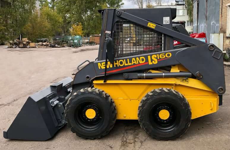 New Holland LS160 Skid Steer Loader Buckets and Tires