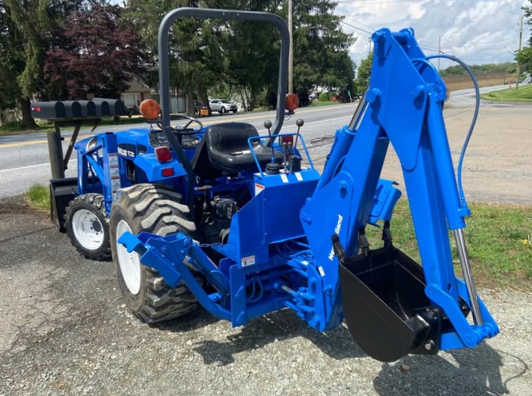 New Holland TC30 Tractor with 757C Backhoe Attachment